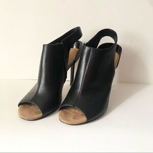 Diane Von Furstenburg black leather sling back peep toe stiletto heels